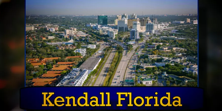 Aerial view of Kendall, Florida, showcasing a mix of residential neighborhoods and commercial buildings lining the main road. A tow truck is seen assisting a vehicle, adding to the bustling scene. The text 