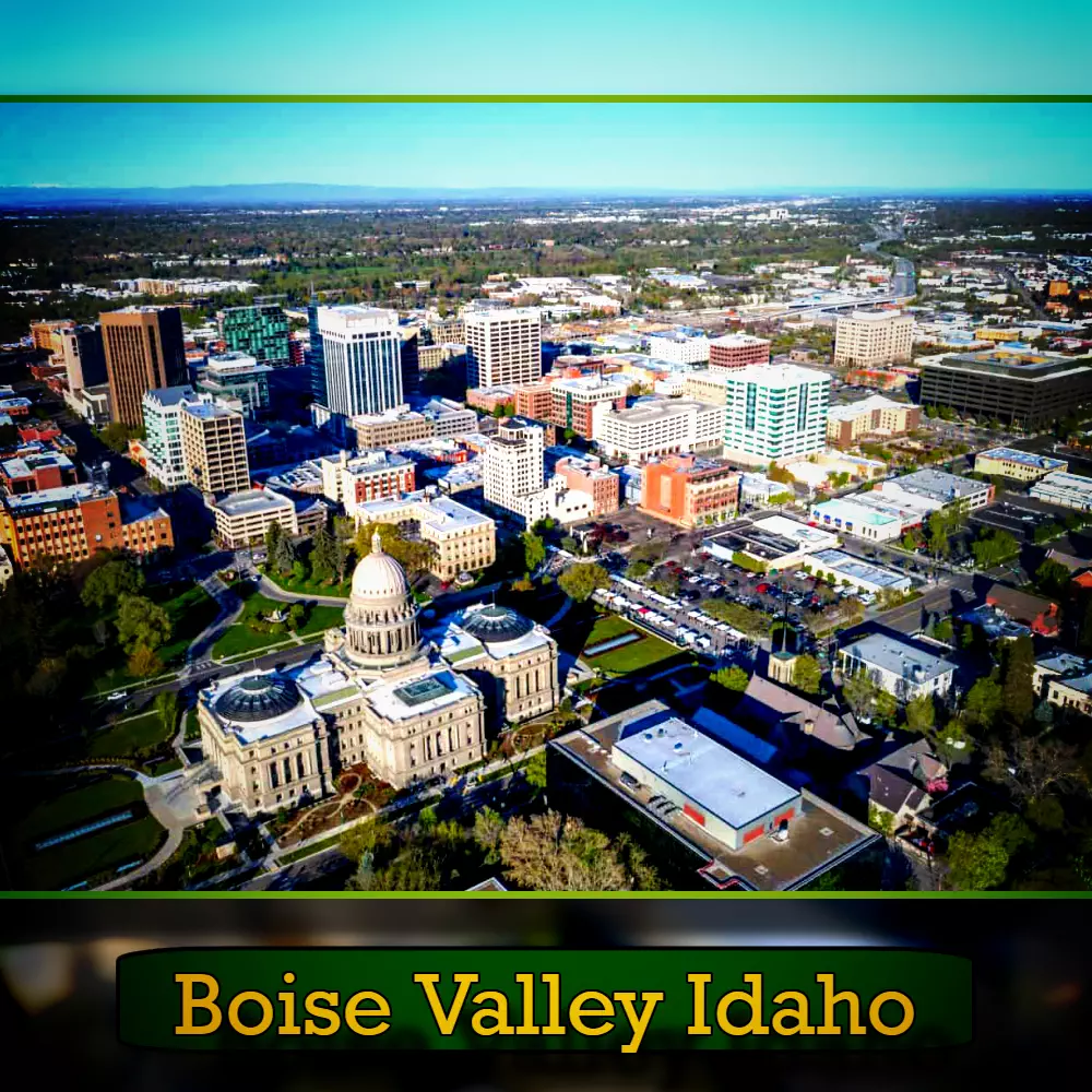 Aerial view of Boise, Idaho, highlighting the state capitol building and surrounding cityscape, with a tow truck navigating the streets below. Text at the bottom reads 