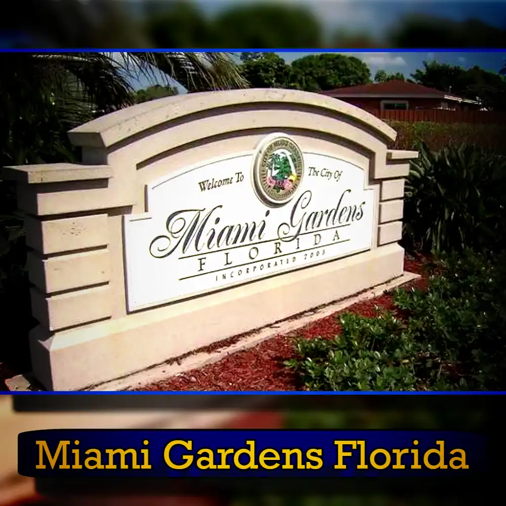 A white sign with gold and black lettering reads 